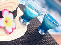 Pair of custom glasses for beach wedding with hand-painted ocean waves on stemless martini glasses by 5th & Rugged.