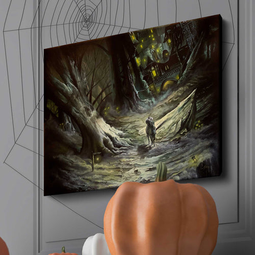 Canvas print hanging on a wall of a spooky forest lit only by a lamp and the headless horseman on a path