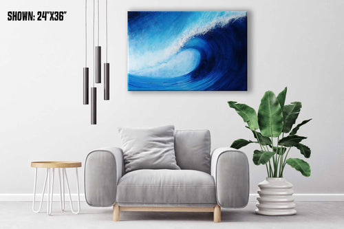 Large wall art of large blue wave curling against a deep blue sky