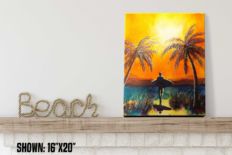 Beach house décor of printed canvas with a surfer on an orange sunset beach with palm trees and ocean