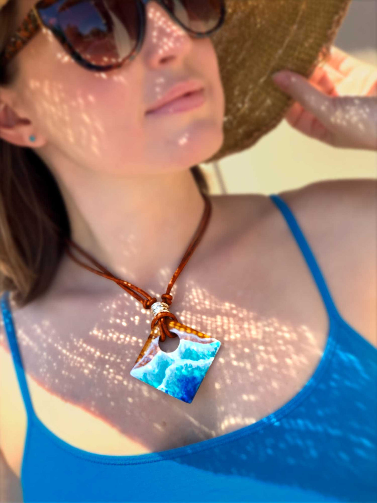 Handmade beach palm jewelry for beach themed wedding. Diamond shaped wood pendant with hand-painted aqua ocean waves.