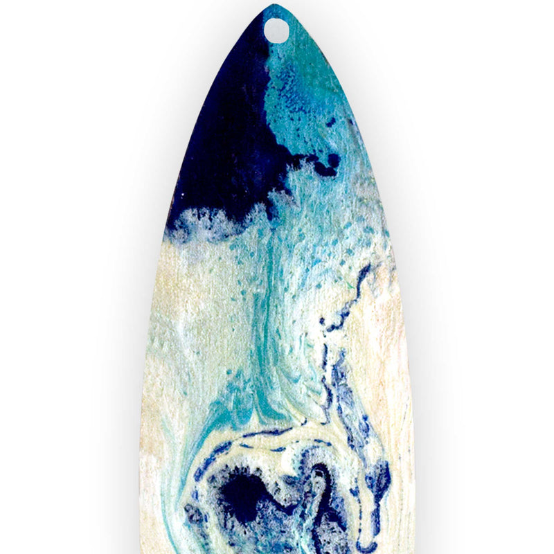 Close up of surfboard Christmas ornament for beach themed Christmas decor in blue and white.