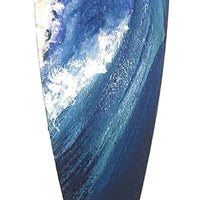 Navy blue Christmas ornament with a hand-painted ocean wave for beach Christmas tree decor.