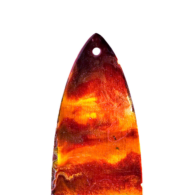 Surfboard Christmas ornaments with warm red and gold sunset landscape behind a black palm tree silhouette.