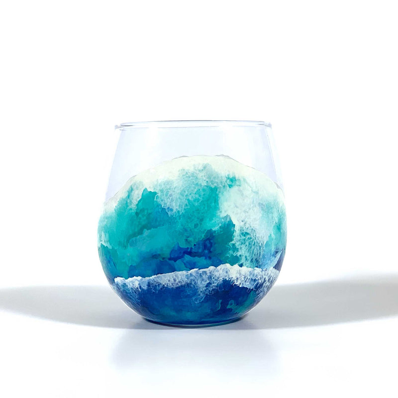 Blue ocean wave glassware. Hand-painted stemless red wine glass, styled as best home bar decor by 5th & Rugged.