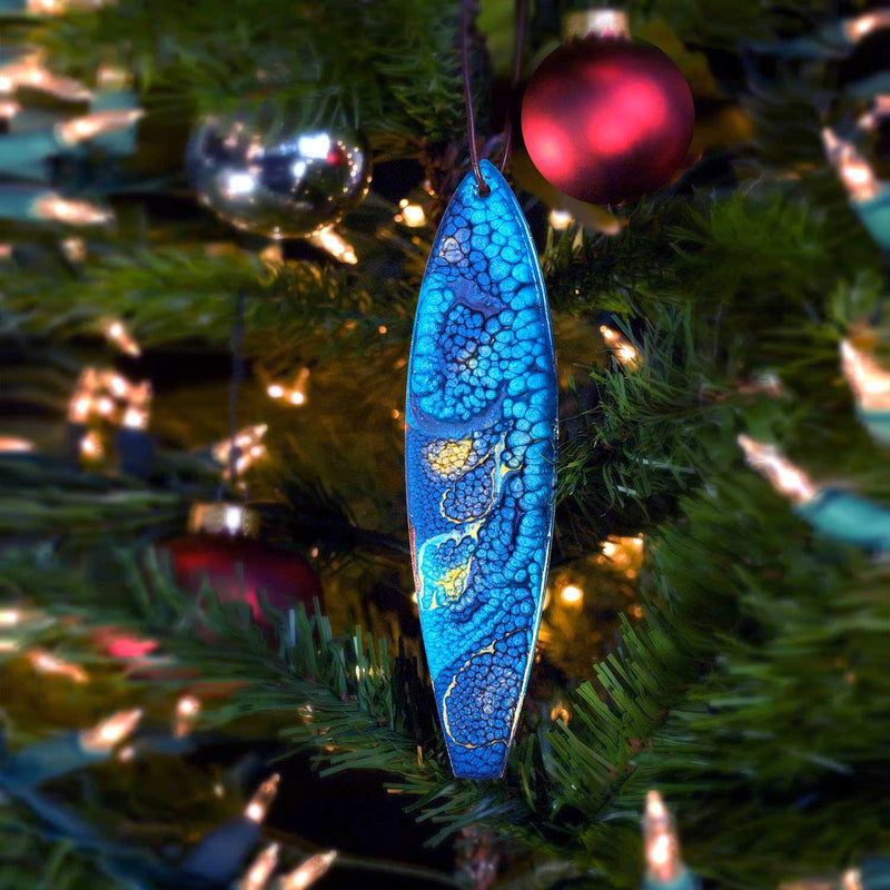 Aqua and navy blue Christmas ornament with starry gold swirls for your blue Christmas tree decor ideas.