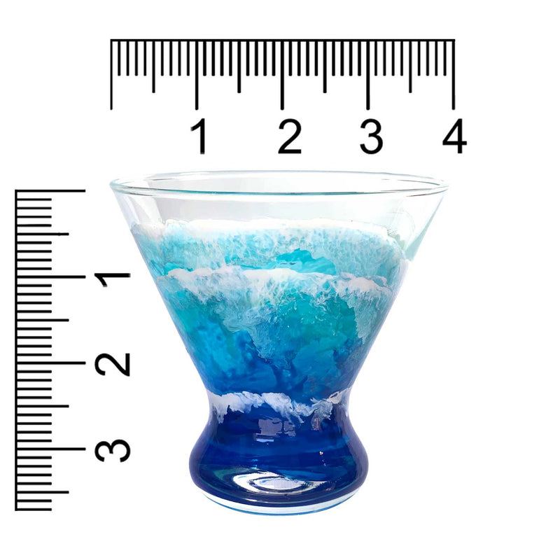 Custom hand-painted martini glass with blue and white ocean waves. Shown with size scale in inches.